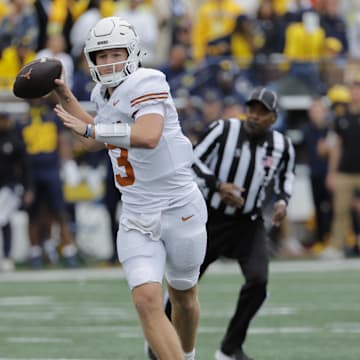 Sep 7, 2024; Ann Arbor, Michigan, USA; Texas Longhorns quarterback Quinn Ewers (3) passes in the first half against the Michigan Wolverines at Michigan Stadium. Mandatory Credit: Rick Osentoski-Imagn Images