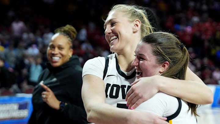Iowa's Sydney Affolter (3) and Taylor Stremlow (1) celebrates following the first round of the NCAA Women's college basketball game between Iowa and Murray State at the Lloyd Noble Center in Norman, Okla., Saturday, March, 22, 2025.