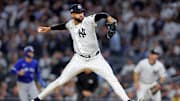 Oct 8, 2025; Bronx, New York, USA; New York Yankees pitcher Devin Williams (38) pitches during the seventh inning against the Toronto Blue Jays during game four of the ALDS round for the 2025 MLB playoffs at Yankee Stadium. Mandatory Credit: Brad Penner-Imagn Images