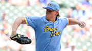 Jul 14, 2024; Milwaukee, Wisconsin, USA; Milwaukee Brewers starting pitcher Rob Zastryzny (58) pitches in the first inning against the Washington Nationals at American Family Field. Mandatory Credit: Benny Sieu-Imagn Images