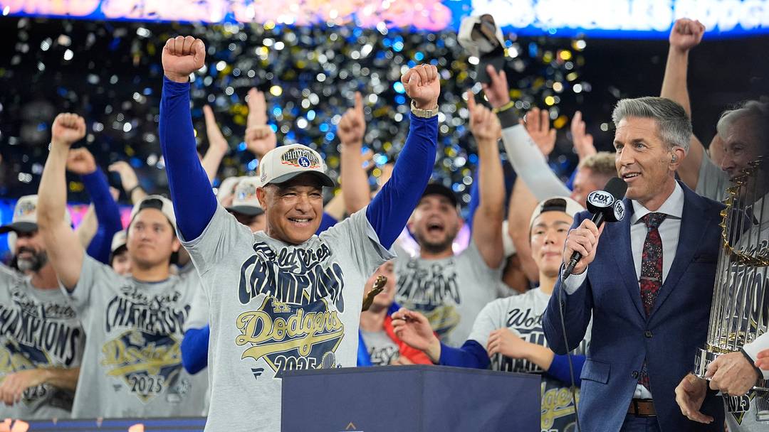 Oct 31, 2025; Toronto, Ontario, CAN; Los Angeles Dodgers manager Dave Roberts (30) celebrates on the podium during the post game celebration after defeating the Toronto Blue Jays in the 2025 MLB World Series at Rogers Centre. Mandatory Credit: John E. Sokolowski-Imagn Images Oct 31, 2025; Toronto, Ontario, CAN; Los Angeles Dodgers manager Dave Roberts (30) celebrates on the podium during the post game celebration after defeating the Toronto Blue Jays in the 2025 MLB World Series at Rogers Centre. Mandatory Credit: John E. Sokolowski-Imagn Images