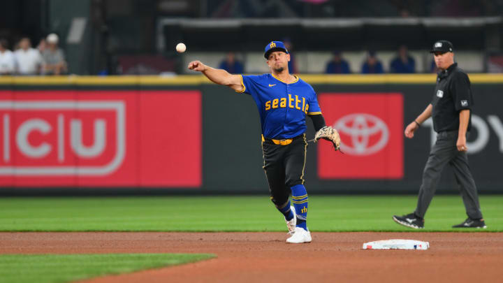 Seattle Mariners shortstop Leo Rivas (76) throws to first base for a force out against the New York Mets during the fifth inning at T-Mobile Park on Aug 9.