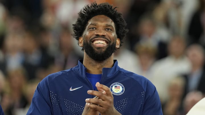 Aug 10, 2024; Paris, France; United States center Joel Embiid (11) celebrates with the gold medal after the game against France.