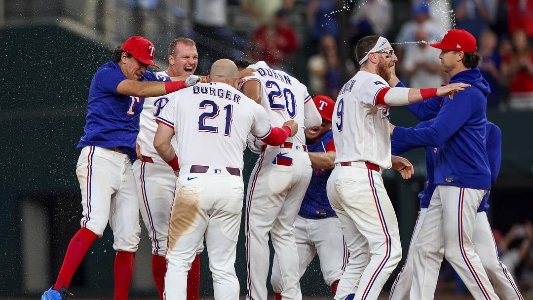 Texas Rangers celebrate a walk-off hit at Globe Life Field. 