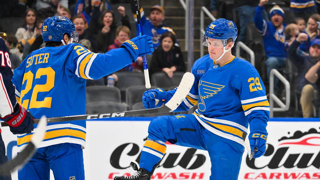 Jan 31, 2026; St. Louis, Missouri, USA; St. Louis Blues right wing Jonatan Berggren (29) celebrates with center Pius Suter (22) after scoring against the Columbus Blue Jackets during the second period at Enterprise Center. Mandatory Credit: Jeff Curry-Imagn Images