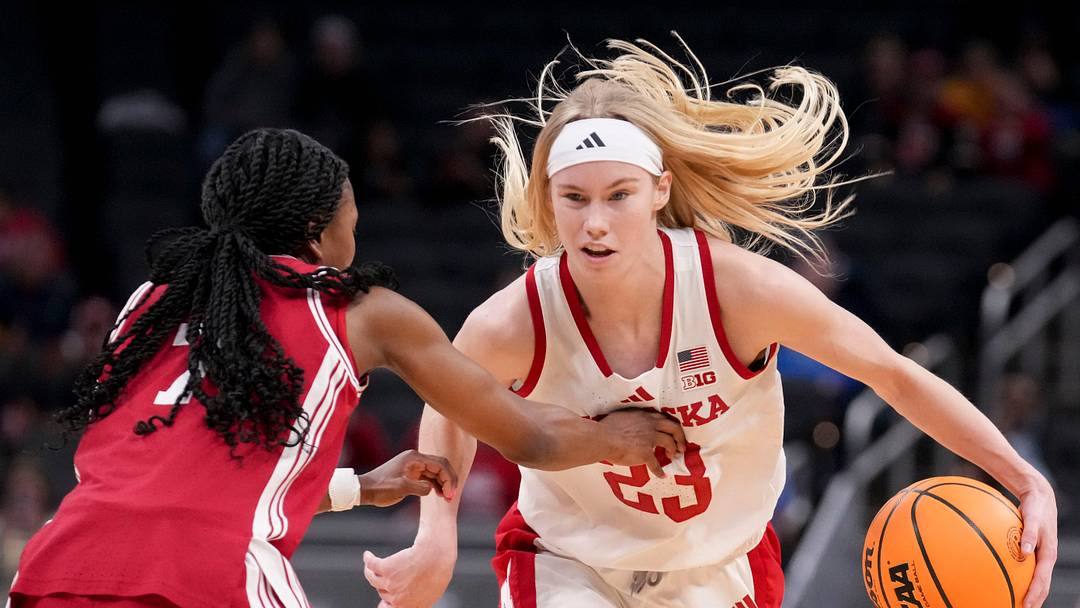 Britt Prince pushes past Indiana guard Jerni Kiaku during a Big Ten tournament game last season. 