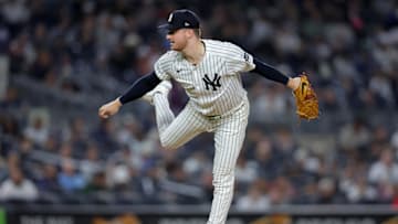 Jun 16, 2025; Bronx, New York, USA; New York Yankees starting pitcher Clarke Schmidt (36) follows through on a pitch against the Los Angeles Angels during the seventh inning at Yankee Stadium. Mandatory Credit: Brad Penner-Imagn Images