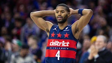 Jan 8, 2025; Philadelphia, Pennsylvania, USA; Washington Wizards guard Jared Butler (4) looks on after a Philadelphia 76ers score in the final minute of the fourth quarter at Wells Fargo Center. Mandatory Credit: Bill Streicher-Imagn Images