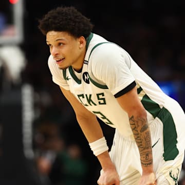 Mar 24, 2025; Phoenix, Arizona, USA; Milwaukee Bucks guard Ryan Rollins (13) against the Phoenix Suns at Footprint Center. Mandatory Credit: Mark J. Rebilas-Imagn Images