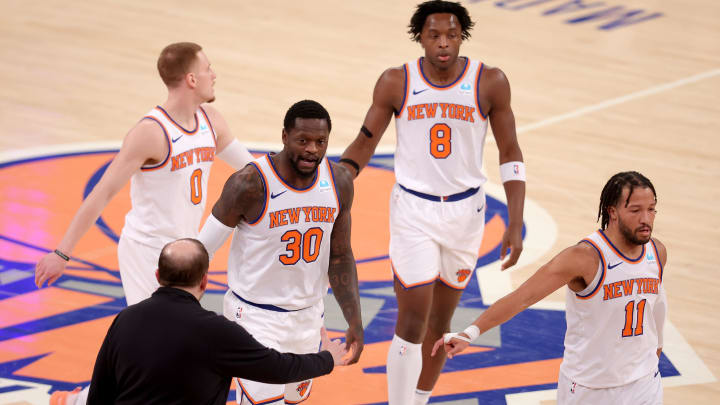 Jan 18, 2024; New York, New York, USA; New York Knicks head coach Tom Thibodeau high fives New York Knicks forward Julius Randle (30) with guard Donte DiVincenzo (0) and forward OG Anunoby (8) and guard Jalen Brunson (11) during the first quarter against the Washington Wizards at Madison Square Garden. Mandatory Credit: Brad Penner-USA TODAY Sports
