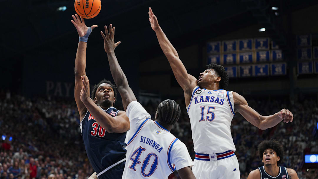 Kansas Jayhawks forward Flory Bidunga (40) and forward Bryson Tiller (15)