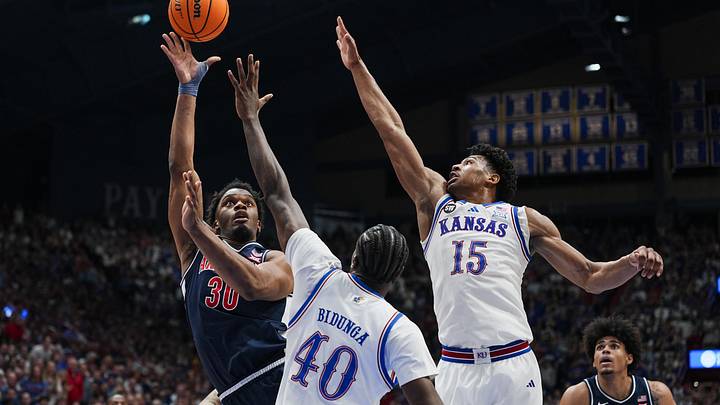 Kansas Jayhawks forward Flory Bidunga (40) and forward Bryson Tiller (15)