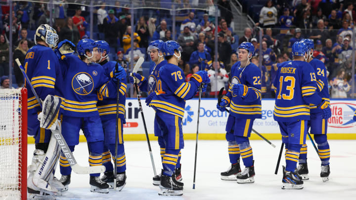 Apr 11, 2024; Buffalo, New York, USA;  The Buffalo Sabres celebrate a win over the Washington Capitals at KeyBank Center. Mandatory Credit: Timothy T. Ludwig-USA TODAY Sports