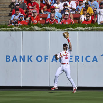 Oct 1, 2023; St. Louis, Missouri, USA;  St. Louis Cardinals center fielder Tommy Edman (19) catches a fly ball against the Cincinnati Reds during the second inning at Busch Stadium. Mandatory Credit: Jeff Curry-USA TODAY Sports