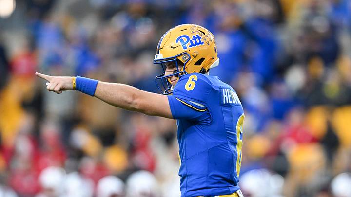 Mason Heintschel #6 of the Pittsburgh Panthers celebrates throwing an 84-yard touchdown pass during the third quarter against the NC State Wolfpack at Acrisure Stadium on October 25, 2025 in Pittsburgh, Pennsylvania.