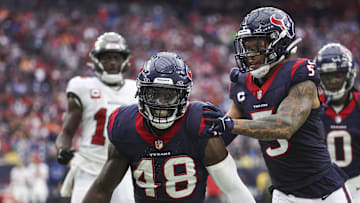Nov 5, 2023; Houston, Texas, USA; Houston Texans linebacker Christian Harris (48) and safety Jalen Pitre (5) react after a defensive play at NRG Stadium. Mandatory Credit: Troy Taormina-Imagn Images