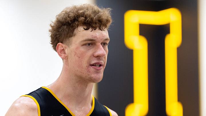 Iowa center Andrew McKeever talks to journalists after a summer basketball practice July 8, 2026 at Carver-Hawkeye Arena in Iowa City, Iowa.