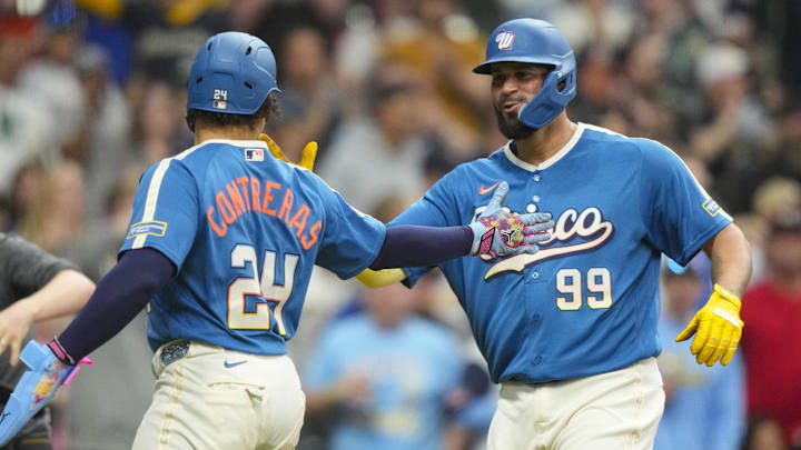 Apr 12, 2026; Milwaukee, Wisconsin, USA;  Milwaukee Brewers designated hitter Gary Sanchez (99) celebrates with catcher William Contreras (24) after hitting a home run during the seventh inning against the Washington Nationals at American Family Field. Mandatory Credit: Jeff Hanisch-Imagn Images