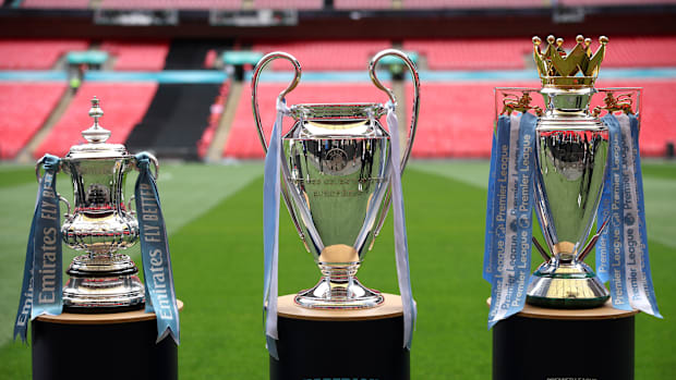 Manchester City's 2022/23 treble.