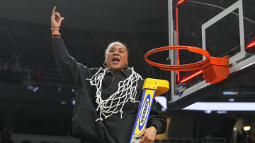 Mar 31, 2024; Albany, NY, USA; South Carolina Gamecocks head coach Dawn Staley celebrates cutting the net.