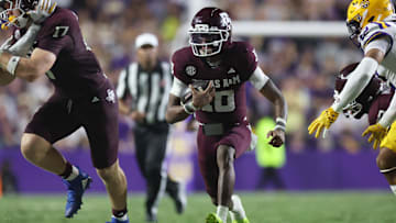 Oct 25, 2025; Baton Rouge, Louisiana, USA; Texas A&M Aggies quarterback Marcel Reed (10) scrambles during the second half against the Louisiana State Tigers at Tiger Stadium. Mandatory Credit: Stephen Lew-Imagn Images