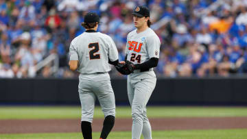 Jun 8, 2024; Lexington, KY, USA; Oregon State Beavers infielder Jabin Trosky (2) hands the ball to pitcher Aiden May (24) during the third inning Kentucky Wildcats at Kentucky Proud Park. Mandatory Credit: Jordan Prather-USA TODAY Sports