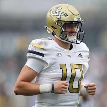 Sep 14, 2024; Atlanta, Georgia, USA; Georgia Tech Yellow Jackets quarterback Haynes King (10) celebrates after a touchdown throw against the Virginia Military Institute Keydets in the second quarter at Bobby Dodd Stadium at Hyundai Field. Mandatory Credit: Brett Davis-Imagn Images