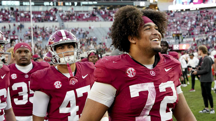 Nov 16, 2024; Tuscaloosa, AL, USA; Alabama Crimson Tide offensive lineman Parker Brailsford (72) smiles as he leaves the field after defeating the Mercer Bears at Bryant-Denny Stadium Mandatory Credit: Gary Cosby Jr.-Imagn Images
