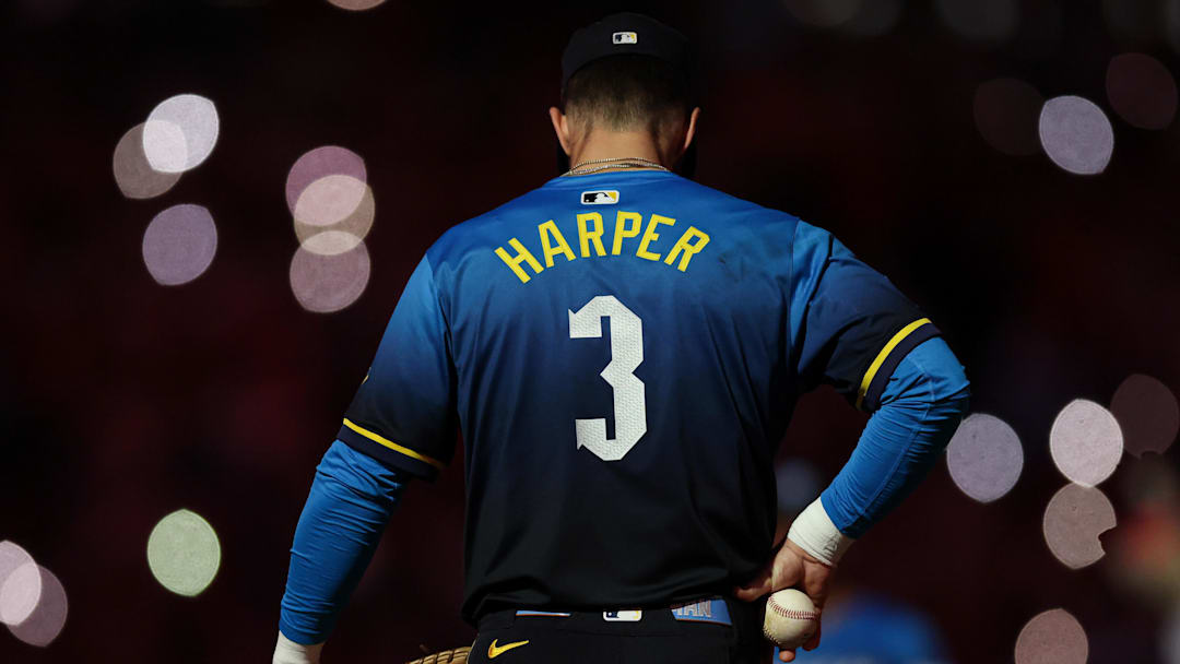 Sep 26, 2025; Philadelphia, Pennsylvania, USA; Philadelphia Phillies first base Bryce Harper (3) looks on during a light show in the ninth inning against the Minnesota Twins at Citizens Bank Park. Mandatory Credit: Bill Streicher-Imagn Images