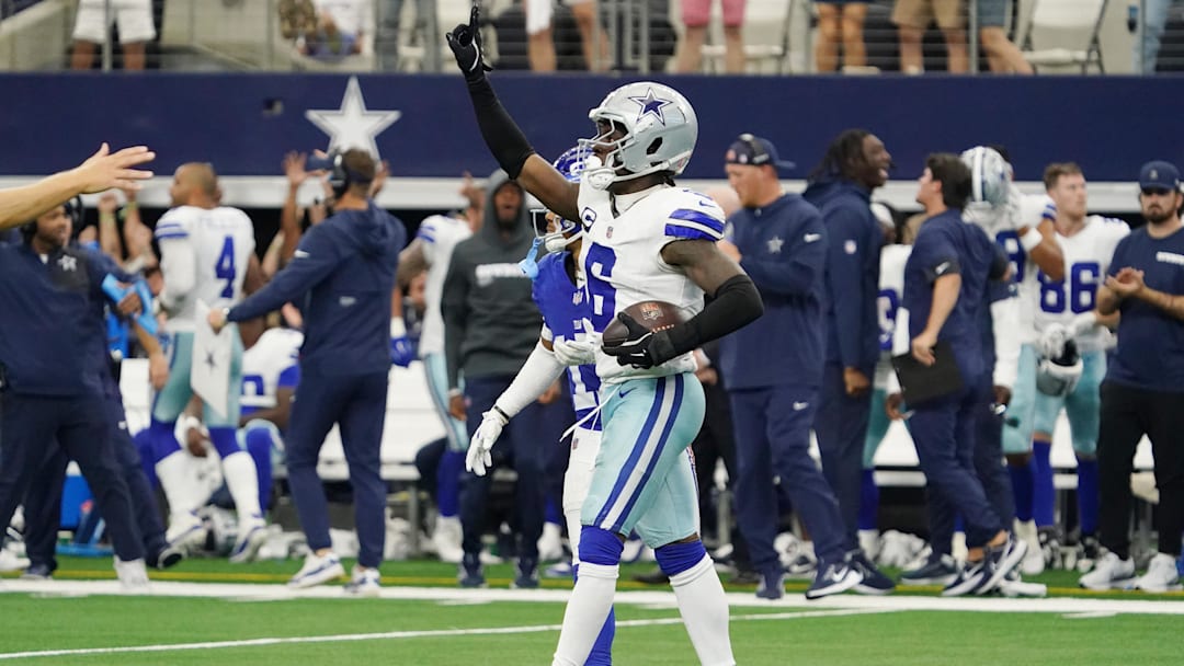 Sep 14, 2025; Arlington, Texas, USA; Dallas Cowboys safety Donovan Wilson (6) reacts after making an interception against the New York Giants during overtime at AT&T Stadium. Mandatory Credit: Raymond Carlin III-Imagn Images