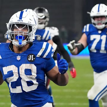 Nov 9, 2025; Berlin, Germany; Indianapolis Colts running back Jonathan Taylor (28) scores the winning touchdown in overtime against the Atlanta Falcons during the NFL Berlin Game at Olympic Stadium. Mandatory Credit: Kirby Lee-Imagn Images