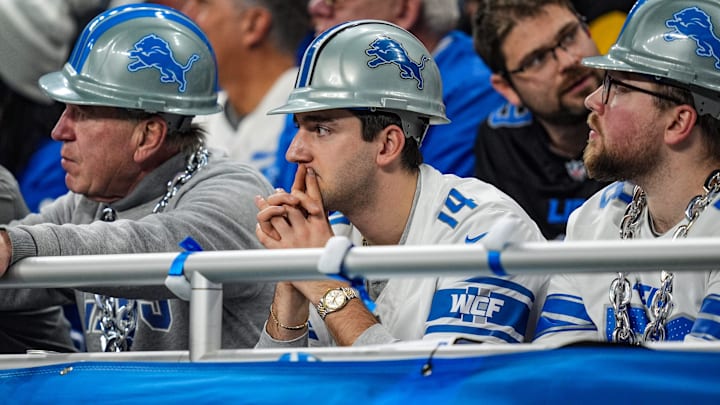 Detroit Lions fans react after the 45-31 loss to the Washington Commanders in the NFC divisional round of the NFL playoffs at Ford Field in Detroit on Saturday, Jan. 18, 2025.