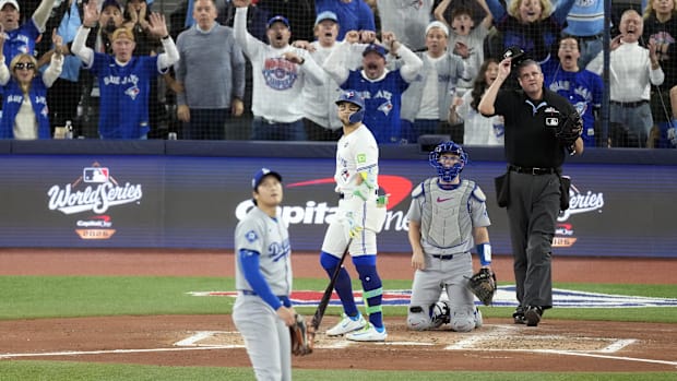 Bichette watching his home run ball in game seven of the world serie