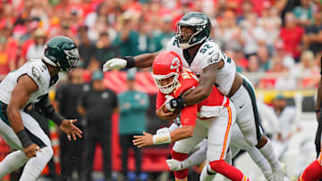 Sep 14, 2025; Kansas City, Missouri, USA; Philadelphia Eagles defensive end Za'Darius Smith (52) sacks Kansas City Chiefs quarterback Patrick Mahomes (15) during the second quarter of the game at GEHA Field at Arrowhead Stadium. Mandatory Credit: Jay Biggerstaff-Imagn Images