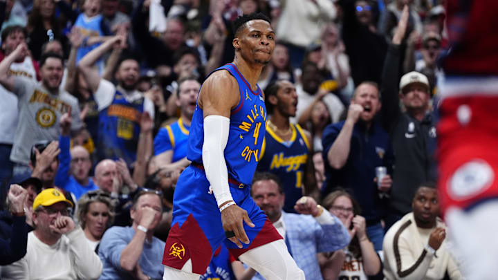 May 3, 2025; Denver, Colorado, USA; Denver Nuggets guard Russell Westbrook (4) reacts after a three point score in the second quarter against the LA Clippers during game seven of first round for the 2025 NBA Playoffs at Ball Arena. Mandatory Credit: Ron Chenoy-Imagn Images