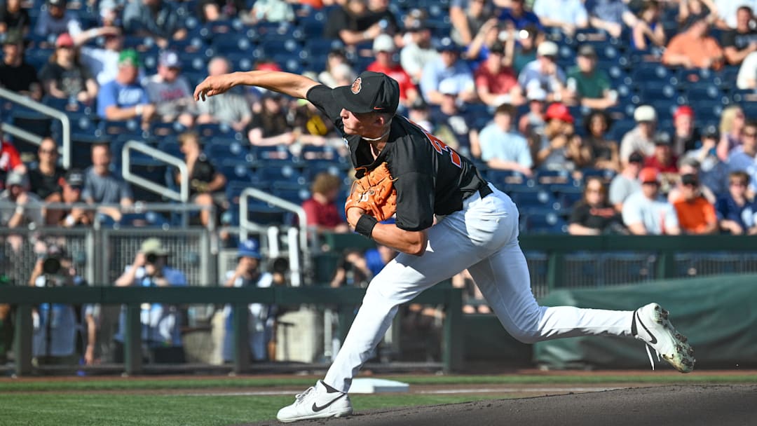 Jun 13, 2025; Omaha, Neb, USA; Oregon State Beavers starting pitcher Dax Whitney (30) throws against the Louisville Cardinals during the first inning at Charles Schwab Field. Mandatory Credit: Steven Branscombe-Imagn Images