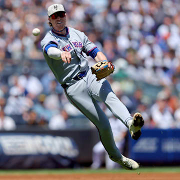 May 17, 2025; Bronx, New York, USA; New York Mets third baseman Brett Baty (7) throws out New York Yankees shortstop Anthony Volpe (not pictured) on a ground ball during the second inning at Yankee Stadium. Mandatory Credit: Brad Penner-Imagn Images