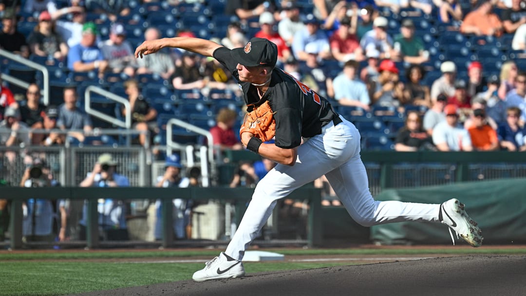 Jun 13, 2025; Omaha, Neb, USA; Oregon State Beavers starting pitcher Dax Whitney (30) throws against the Louisville Cardinals during the first inning at Charles Schwab Field. Mandatory Credit: Steven Branscombe-Imagn Images