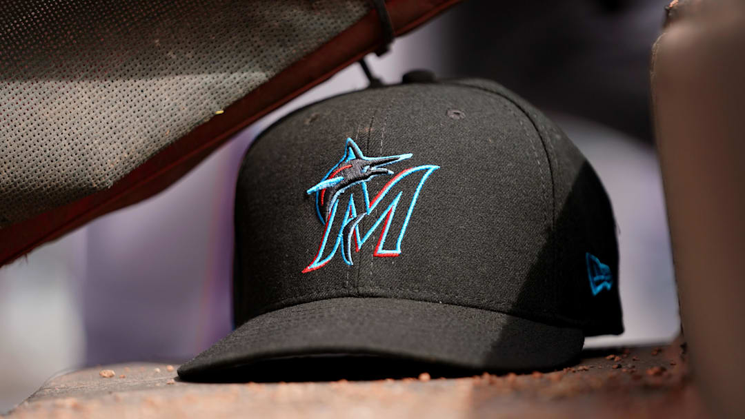 Apr 11, 2019; Cincinnati, OH, USA; A view of a New Era Miami Marlins hat in the dugout during the game against the Cincinnati Reds at Great American Ball Park. 