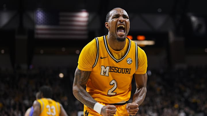 Dec 8, 2024; Columbia, Missouri, USA; Missouri Tigers guard Tamar Bates (2) celebrates after a play against the Kansas Jayhawks during the first half at Mizzou Arena. Mandatory Credit: Jay Biggerstaff-Imagn Images Dec 8, 2024; Columbia, Missouri, USA; Missouri Tigers guard Tamar Bates (2) celebrates after a play against the Kansas Jayhawks during the first half at Mizzou Arena. Mandatory Credit: Jay Biggerstaff-Imagn Images