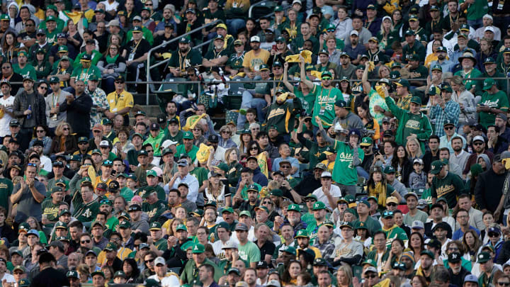 Oct 2, 2019; Oakland, CA, USA; Fans cheer during the second inning of the game between the Oakland Athletics and the Tampa Bay Rays in the 2019 American League Wild Card playoff baseball game at RingCentral Coliseum. Mandatory Credit: Stan Szeto-USA TODAY Sports