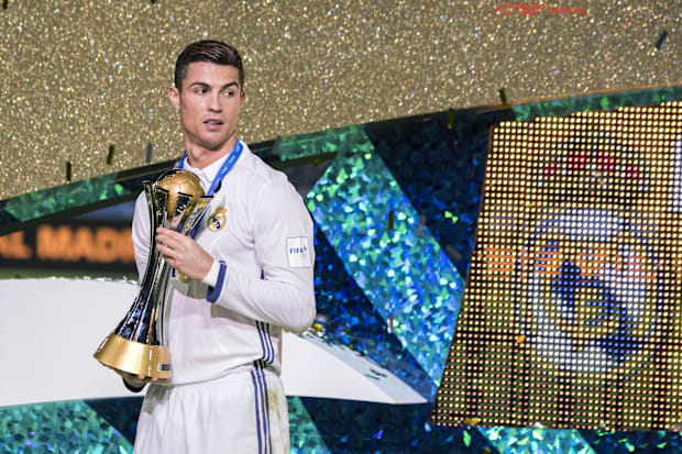 Cristiano Ronaldo with the old Club World Cup trophy.