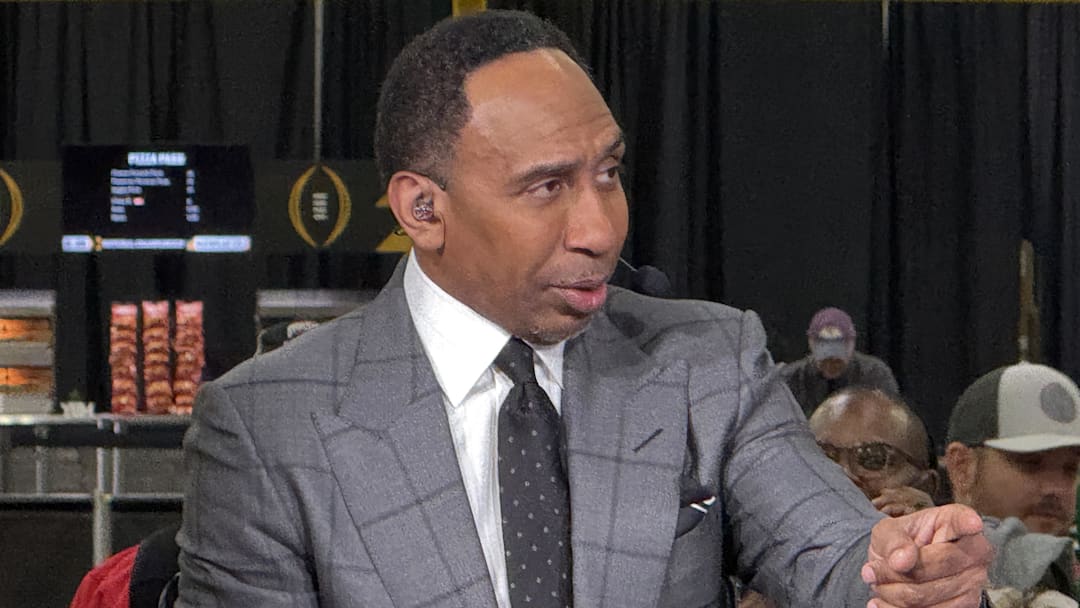 ESPN personality Stephen A. Smith on the ESPN First Take set at the CFP Fan Central at the George World Congress Center. ESPN personality Stephen A. Smith on the ESPN First Take set at the CFP Fan Central at the George World Congress Center.