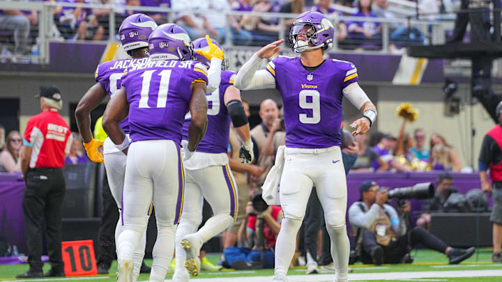 Minnesota Vikings quarterback J.J. McCarthy (9) celebrates wide receiver Trent Sherfield Sr.'s touchdown against the Las Vegas Raiders in the third quarter at U.S. Bank Stadium in Minneapolis on Aug. 10, 2024. Minnesota Vikings quarterback J.J. McCarthy (9) celebrates wide receiver Trent Sherfield Sr.'s touchdown against the Las Vegas Raiders in the third quarter at U.S. Bank Stadium in Minneapolis on Aug. 10, 2024.