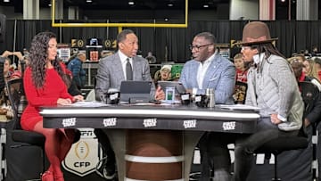 Jan 20, 2025; Atlanta, GA, USA; The hosts of ESPN First Take, Molly Qerim, Stephen A. Smith, Shannon Sharpe and Cam Newton, at the CFP Fan Central at the George World Congress Center. Mandatory Credit: Kirby Lee-Imagn Images
