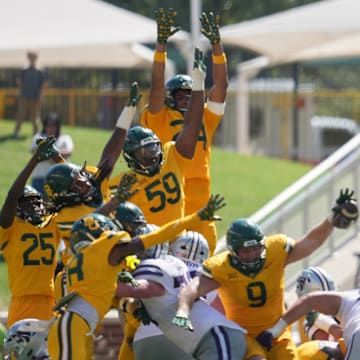 Oct 4, 2025; Waco, Texas, USA; Baylor Bears defensive lineman Cooper Lanz (9) blocks a field goal attempt by Kansas State Wildcats quarterback Blake Barnett (13) at the end of the second half at McLane Stadium. Mandatory Credit: Chris Jones-Imagn Images