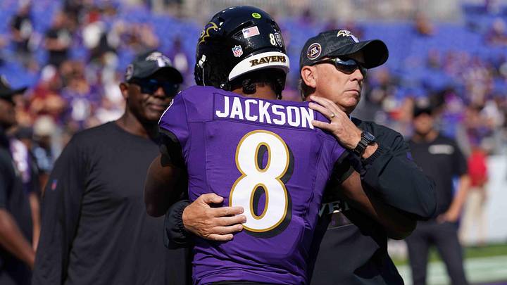 Oct 13, 2024; Baltimore, Maryland, USA; Baltimore Ravens quarterback Lamar Jackson (8) greets offensive coordinator Todd Monken prior to the game against the Washington Commanders at M&T Bank Stadium. Mandatory Credit: Mitch Stringer-Imagn Images