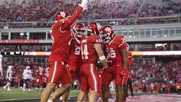 Nov 22, 2025; Houston, Texas, USA; Houston Cougars running back Dean Connors (44) celebrates with teammates after scoring a touchdown during the third quarter against the TCU Horned Frogs at TDECU Stadium. Mandatory Credit: Troy Taormina-Imagn Images