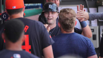 Mar 10, 2024; Port St. Lucie, Florida, USA;  Detroit Tigers second baseman Jace Jung (84) is congratulated by teammates after scoring a run in the eighth inning against the New York Mets at Clover Park. Mandatory Credit: Jim Rassol-USA TODAY Sports