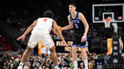 Mar 14, 2025; Kansas City, MO, USA; Brigham Young Cougars guard Egor Demin (3) dribbles against Houston Cougars guard L.J. Cryer (4) during the second half at T-Mobile Center. Mandatory Credit: William Purnell-Imagn Images